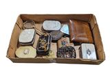 a box of assorted items sitting on a white surface