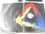 a picture of a book with a picture of a triangle on it