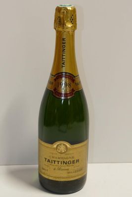 a bottle of champagne that is sitting on a table