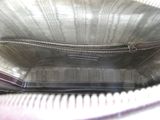 a close up of a purse with a zipper on it