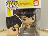 a close up of a pop vinyl figure in a box