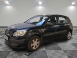 a picture of a black car parked in a garage