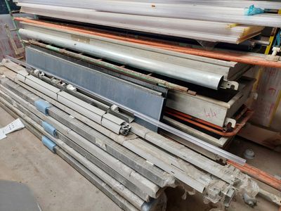 many different types of pipes and pipes stacked on top of each other