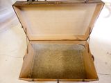 an open suitcase sitting on the floor on the floor