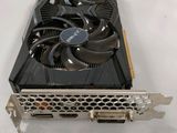 a close up of a video card sitting on top of a table