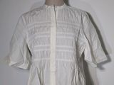 une image d'une chemise blanche sur un mannequin, un mannequin, un mannequin, un mannequin, un mannequin, un mannequin, un mannequin, un mannequin