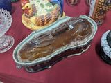 a table that has many different types of glassware on it