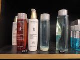 many different types of skin care products on a shelf