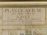 a drawing of a plan of a house with a garden in it