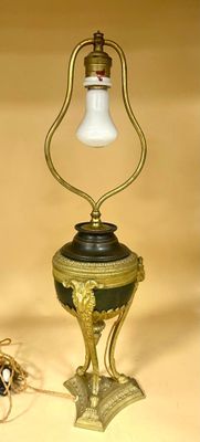 a lamp that is sitting on a table next to a bug