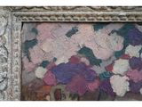 un tableau représentant des fleurs dans un vase, encadré