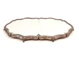 an image of a silver tray with a mirror on it