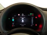 the dashboard of a car with a digital display on it