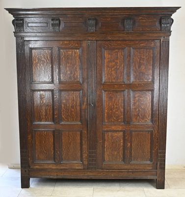 an image of a wooden armoire in a room