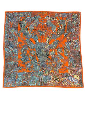 an orange and blue paisley print pocket square