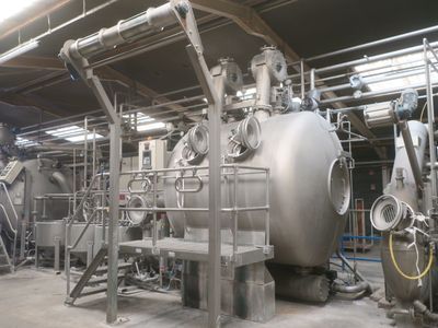 a large tank that is sitting inside of a building