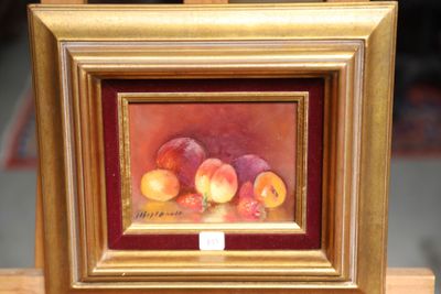 a picture of a painting of peaches in a gold frame