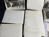 several old black and white photos of people on a table