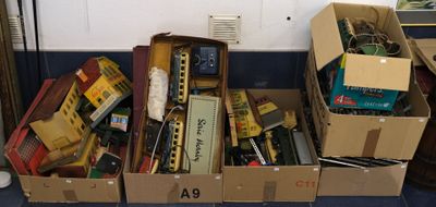 many boxes of toy trains sitting on the floor