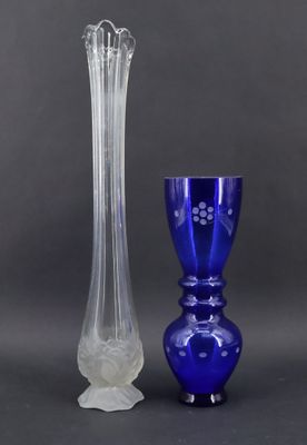 two vases sitting next to each other on a table