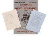 three books on a table with a drawing of a man on a motorbike
