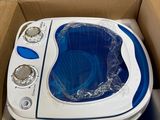 a box with a blue and white toilet inside of it