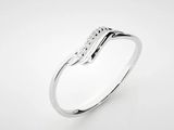 a white gold ring with diamonds on a white background