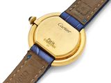 an image of a close up of a wrist watch on a white surface
