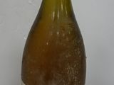 a bottle of wine that is sitting on a table