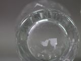 a close up of a wine glass with a label on it