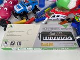 a box of electronic organ toys sitting on a table