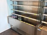 a refrigerated display case in a store