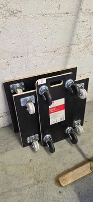 three skateboards that are attached to the wall