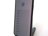 an image of a cell phone sitting on top of a stand