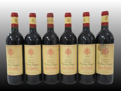 six bottles of red wine are lined up in a row