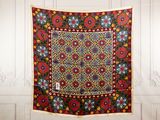 an image of a tapestry hanging on a wall