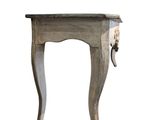 an image of a small table with a drawer on it