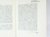an open book with a picture of a cat on it ' s cover