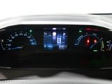 a close up of a car dashboard with a speedometer