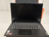 a laptop computer sitting on top of a table