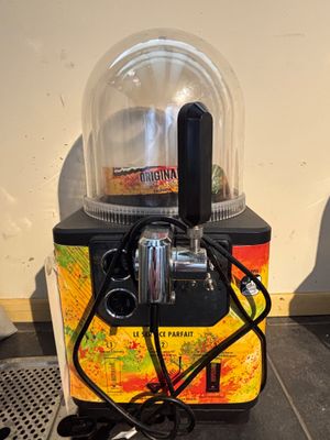 a blender with a blender on top of it on a counter