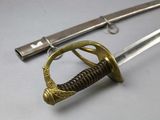 a sword that is laying on a table