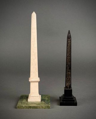 pair of obelisk and obelisk on marble bases