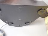 an image of a speaker with a cord connected to it