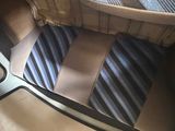 a close up view of a seat with a tie on it