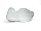a white bird figurine sitting on a white surface