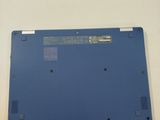 a blue laptop that is sitting on a table