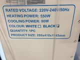 an image of a box of water heater sitting on top of a table