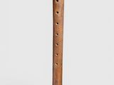 a close up of a wooden flute on a white background