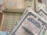 a pile of old papers sitting on a table